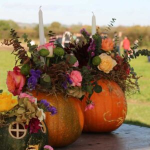 Flowers in a pumpkin arrangement
