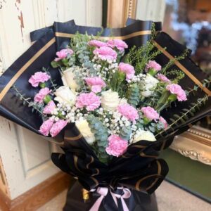 pink carnations and ivory roses